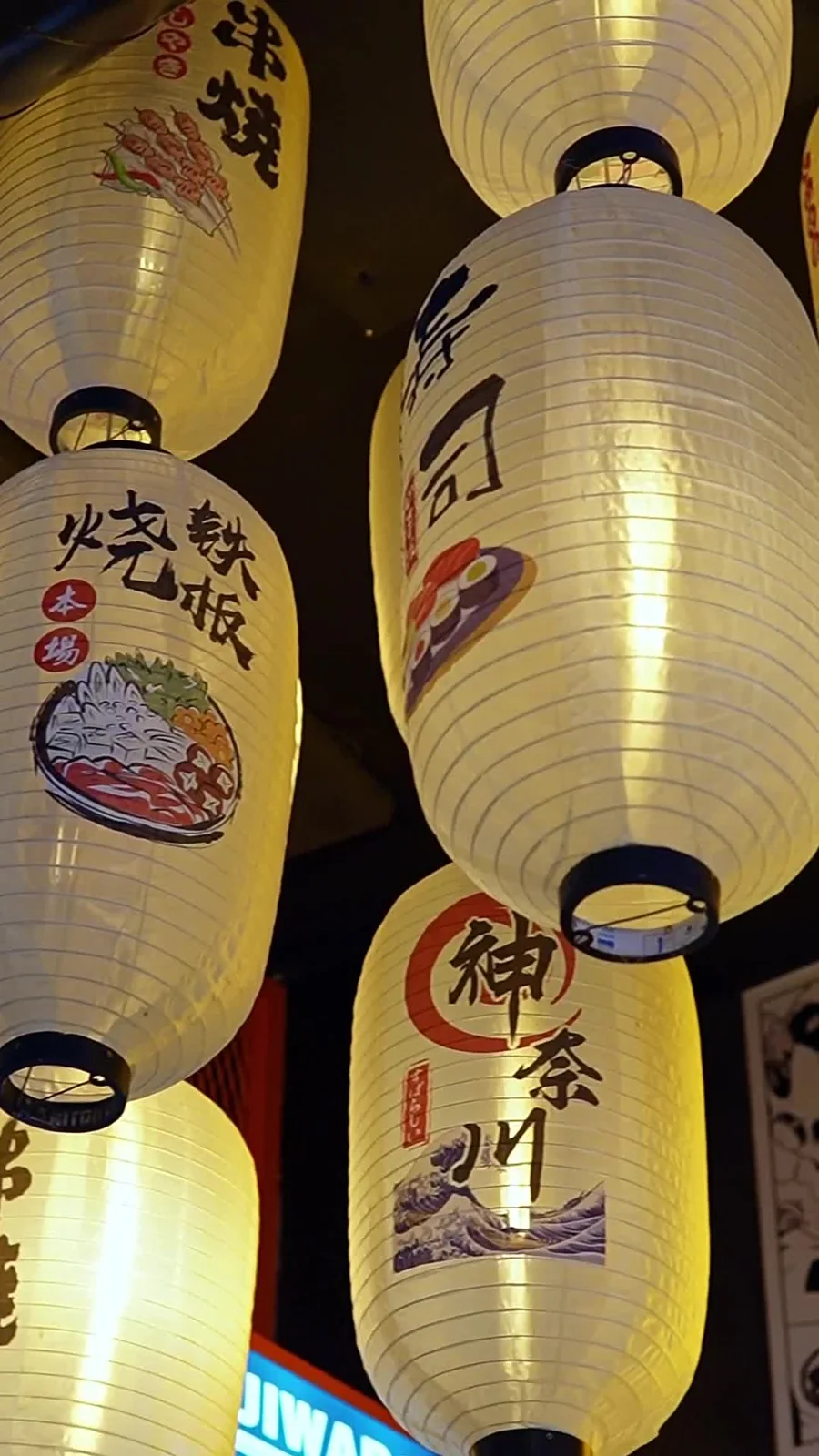 Japanese lanterns inside Buga Ramen in Alicante, shown in the finished restaurant film